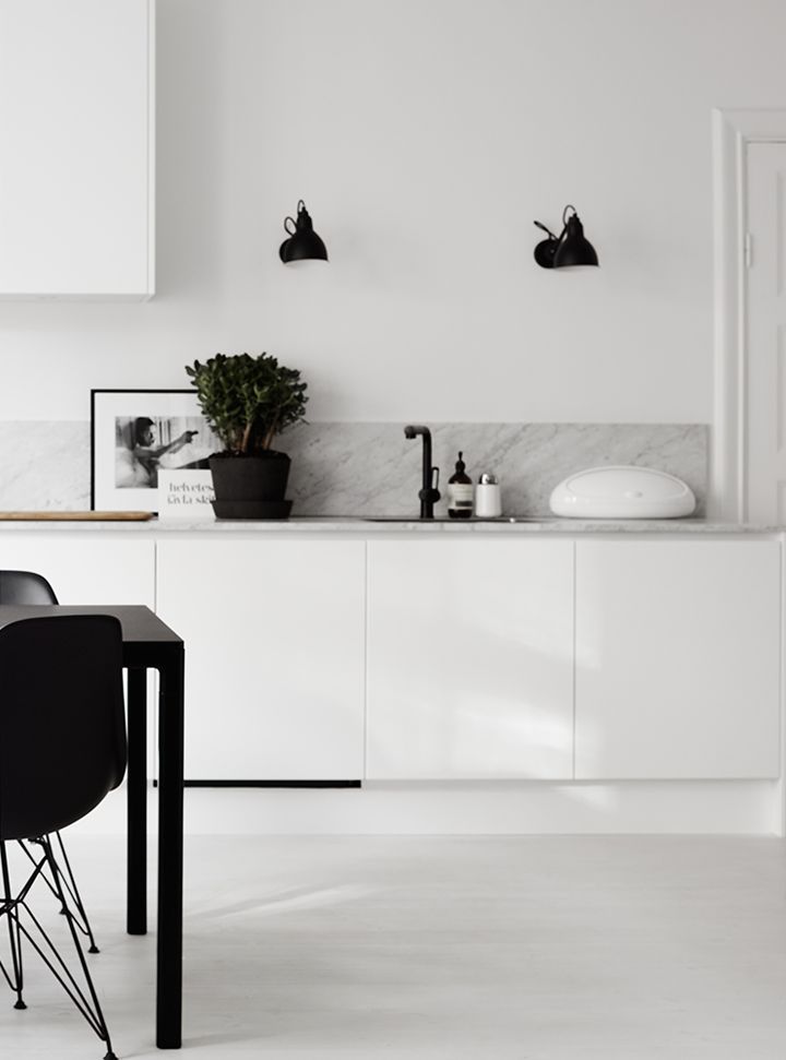 Pins of the week at The Design Library Au 3rd May - White kitchen with marble bench top via The Design Chaser | desiglibrary.com.au